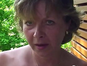 Busty milf shows her pussy in a close-up
