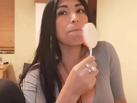 Big boobs girl sucking her lollipop