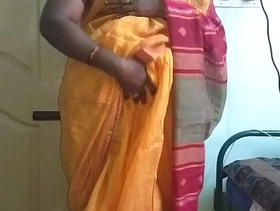 Desi indian horny tamil telugu kannada malayalam hindi cheating wife vanitha wearing orange colour saree showing big boobs and shaved pussy press hard boobs press nip rubbing pussy masturbation