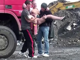 Cute blonde little girl fucked by 2 guys at a public construction site threesome
