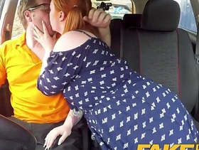 Fake driving school voluptuous redhead fucks in car